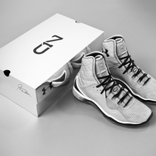 Cam_highlight_trainer_veneer_white_black_shoe_box